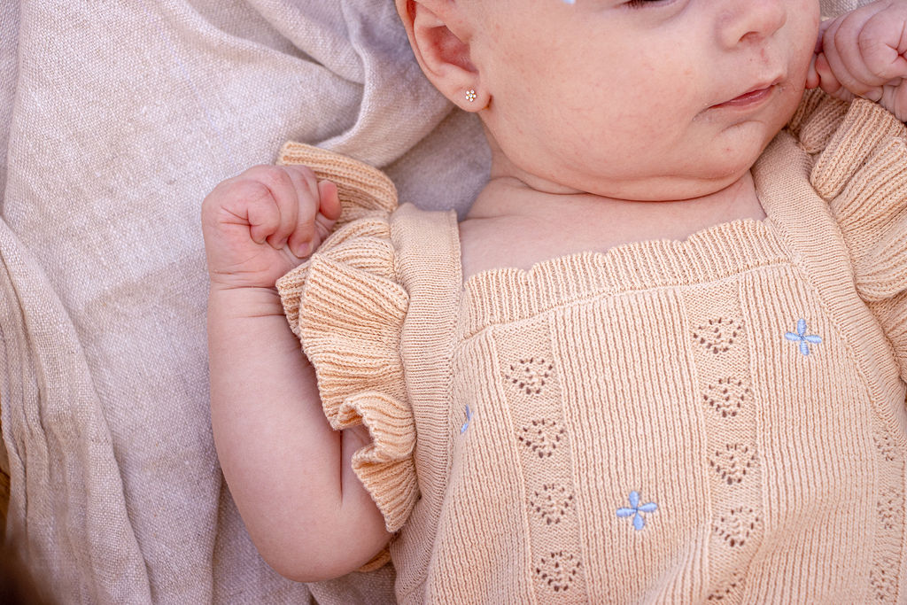 Sienna Ruffle Knit Pointelle Romper | Coastal Beige | WYLDE. Wylde. Clothing for Kids