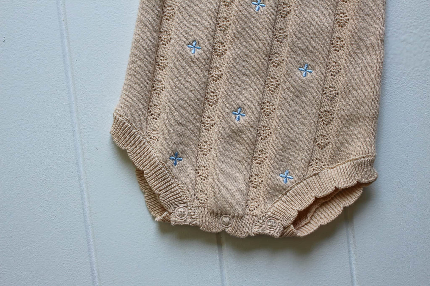 Sienna Ruffle Knit Pointelle Romper | Coastal Beige | WYLDE. Wylde. Clothing for Kids