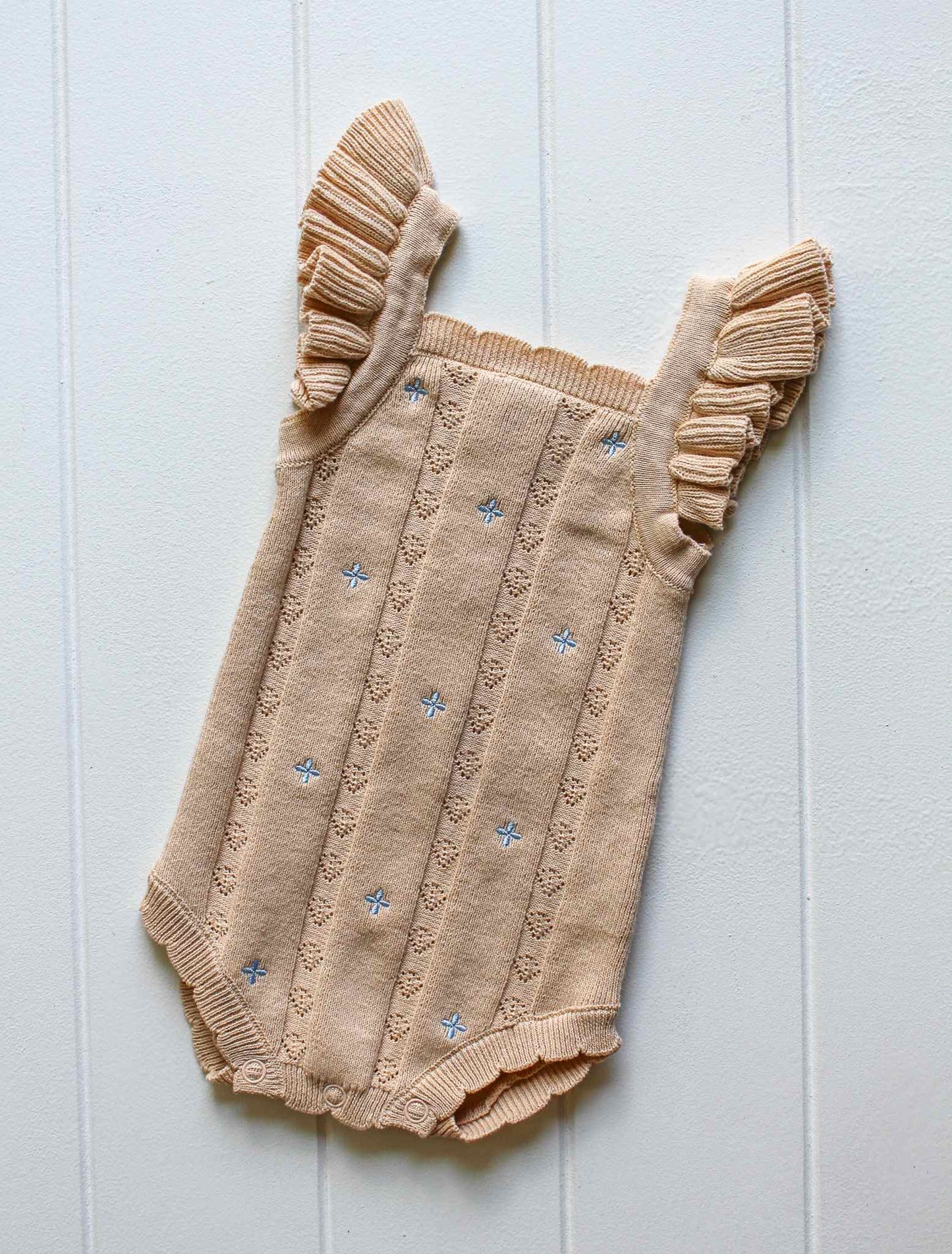 Sienna Ruffle Knit Pointelle Romper | Coastal Beige | WYLDE. Wylde. Clothing for Kids