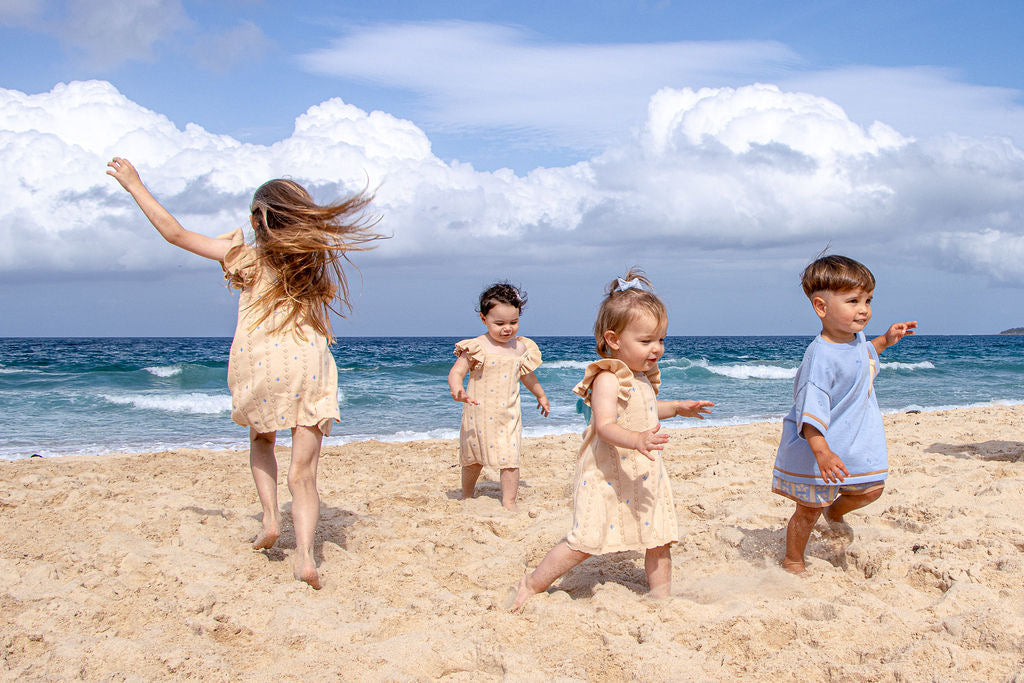 NEW Della Ruffle Knit Pointelle Dress | Coastal Beige | WYLDE. Wylde. Clothing for Kids