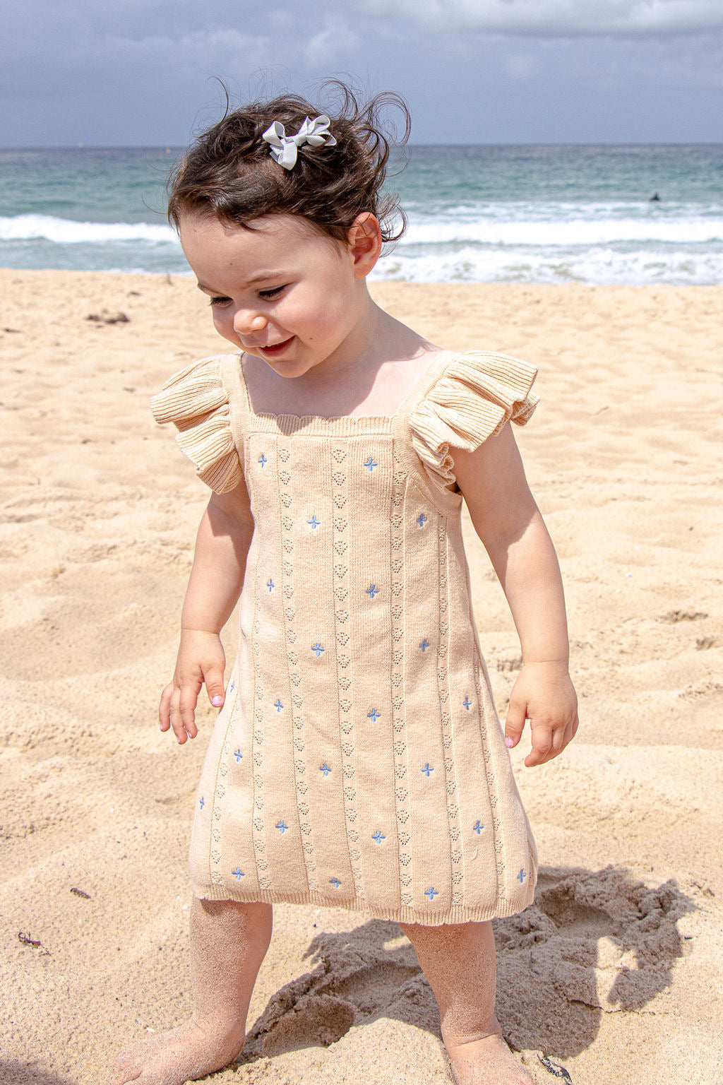 NEW Della Ruffle Knit Pointelle Dress | Coastal Beige | WYLDE. Wylde. Clothing for Kids