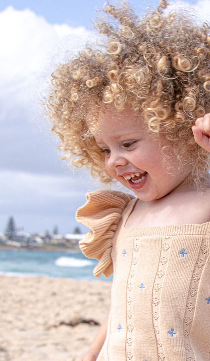 NEW Della Ruffle Knit Pointelle Dress | Coastal Beige | WYLDE. Wylde. Clothing for Kids